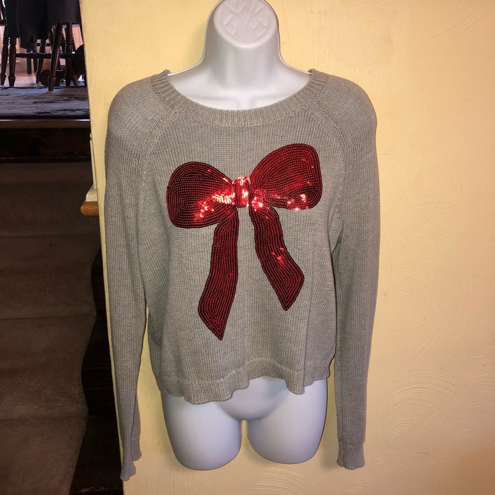 BETHANY MOTA SEQUENCE BOW HOLIDAY SWEATER